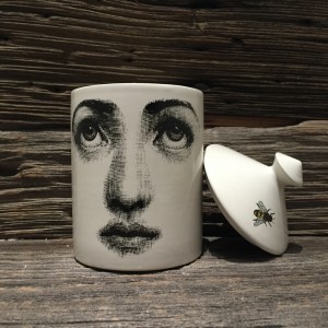 This candle, from Milan's acclaimed For­nasetti atelier, makes a wonderful gift. 
