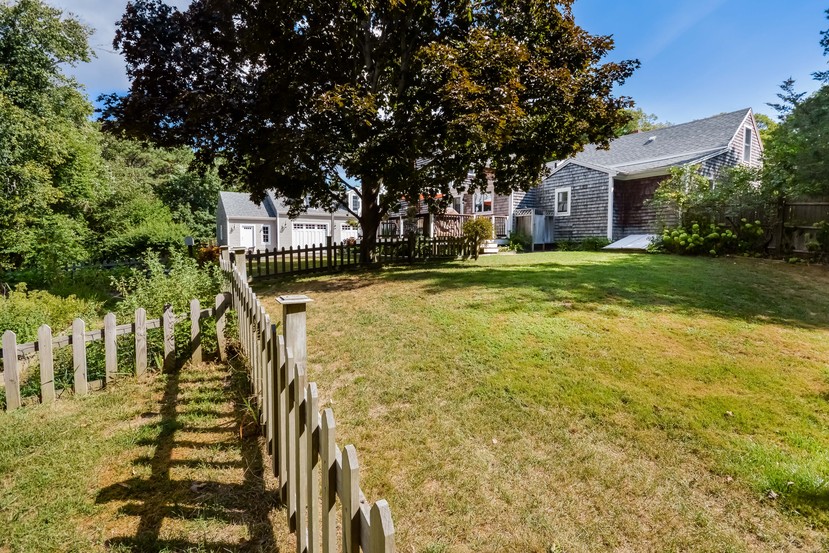 Cape Cod home with fenced yard suitable for horses