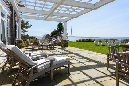 Waterfront terrace at 123 Penzance Road on Penzance Point in Woods Hole