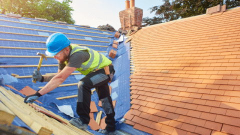 Exterior Remodeling Projects for Home Selling- Man Replacing Roof