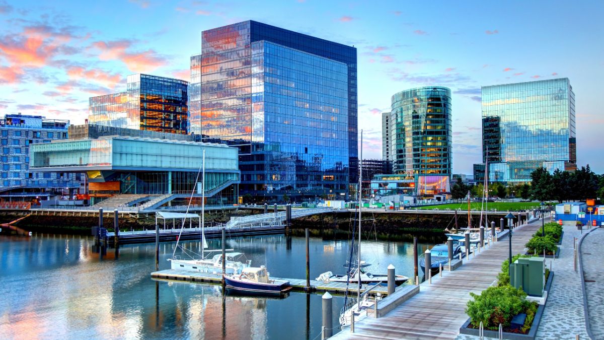 Boston Seaport District with harbor views and modern buildings