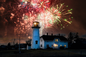 4th of July in Chatham, MA- View of fireworks and lighthouse