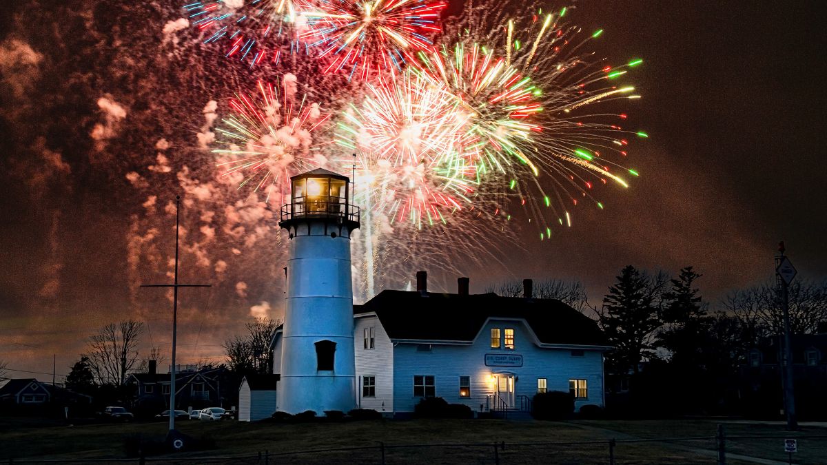 Fireworks over Chatham Lighthouse during Fourth of July celebrations