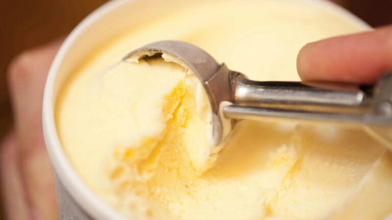 Scooping vanilla ice cream - Best Ice cream on the South Coast
