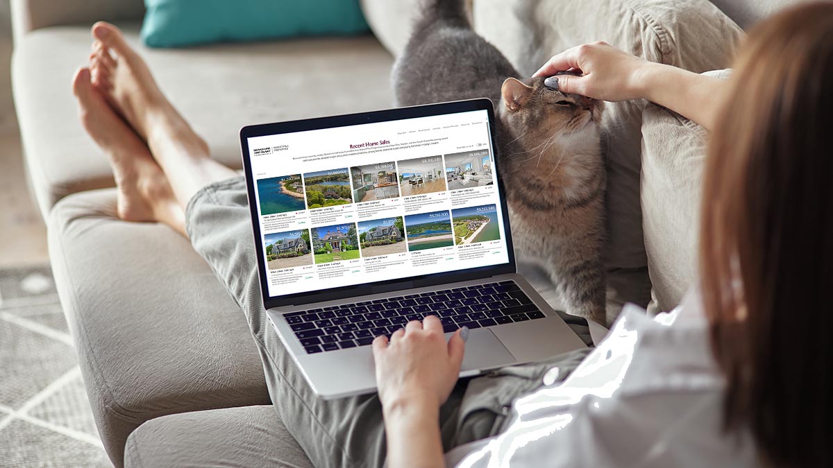 Homeowner reviewing comparable sales to estimate home value