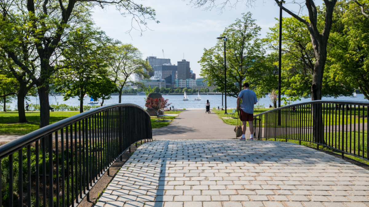 Charles River Esplanade walking path with Boston skyline view