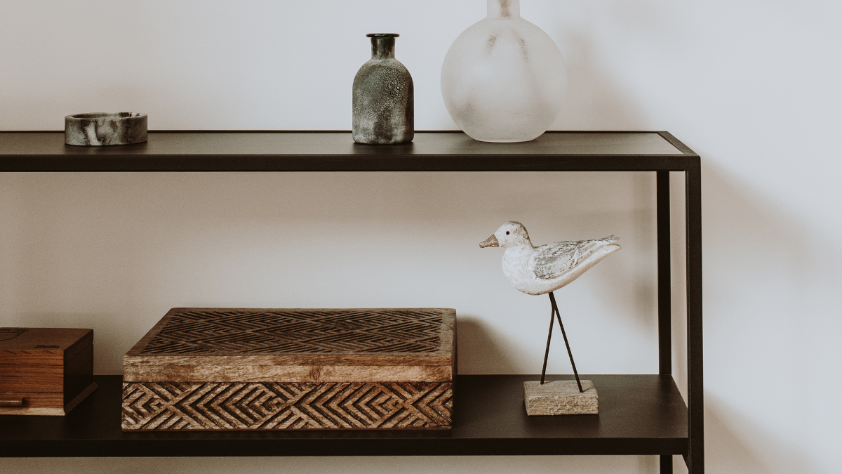 minimalist shelf styling replacing outdated home decor before selling