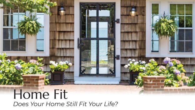 coastal Massachusetts home exterior with front door and water view