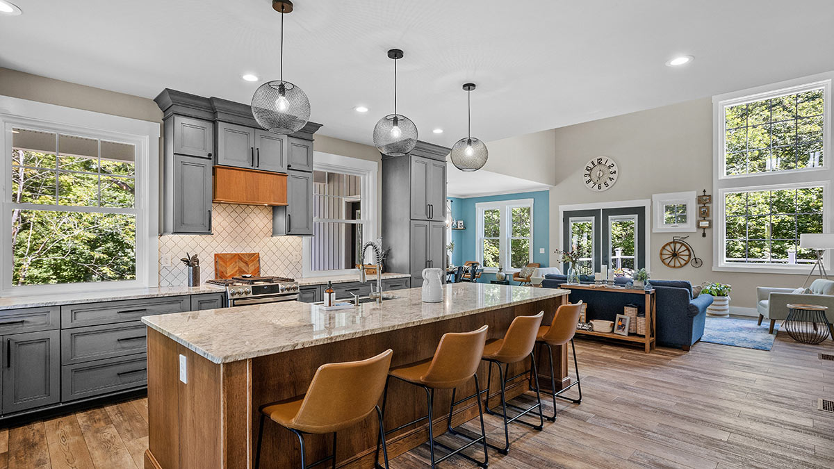 Move-in ready kitchen with a large island, ample seating and natural light
